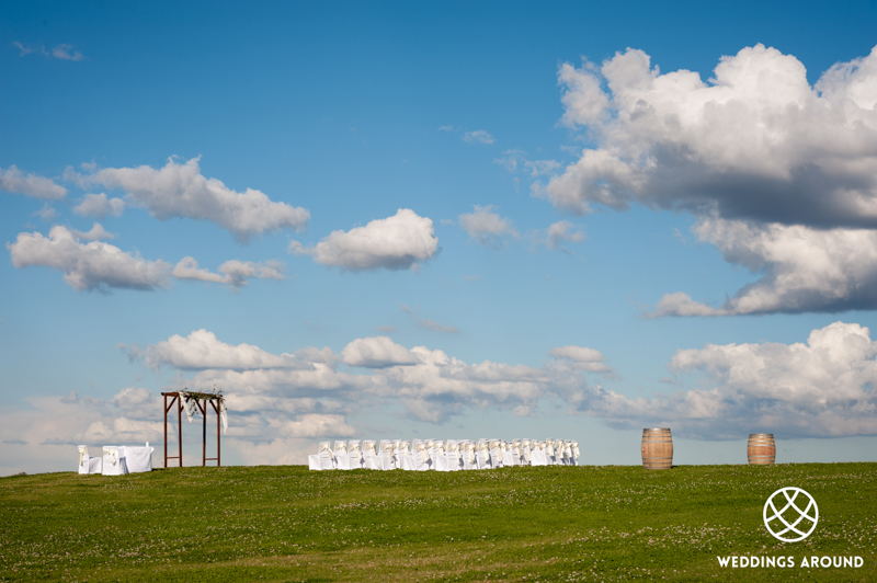 Wedding ceremony set high on a hill with spectacular views